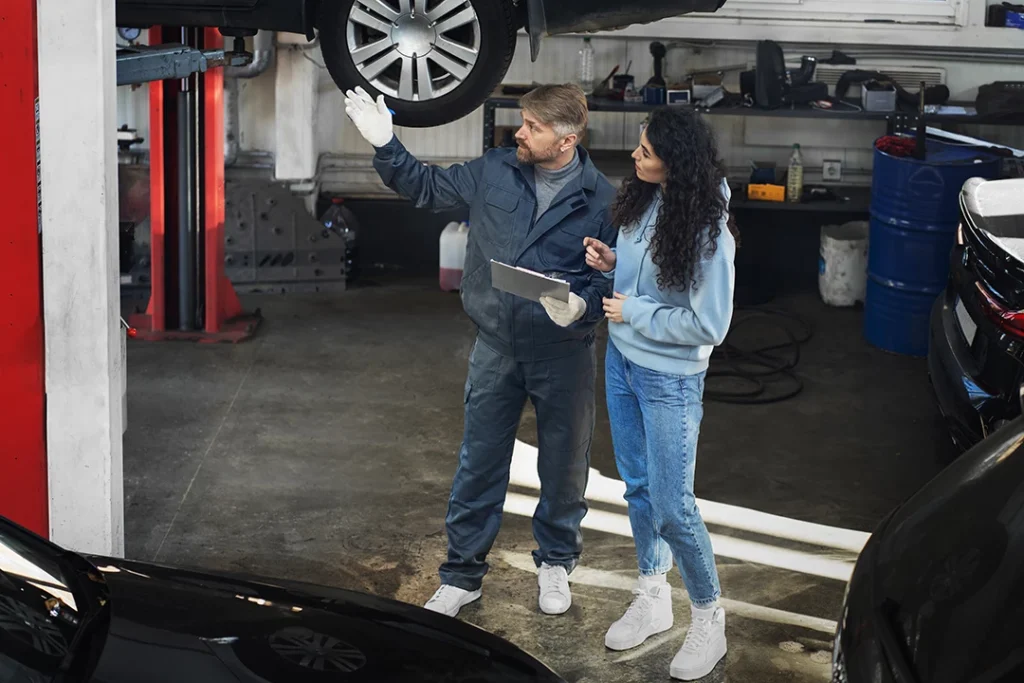 Conversation about vehicle condition during the Villages Of Northpointe West used car mobile inspection.