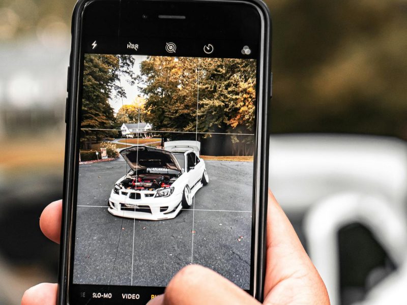 Used car inspection with report Houston — inspector documenting findings with photos for same-day delivery